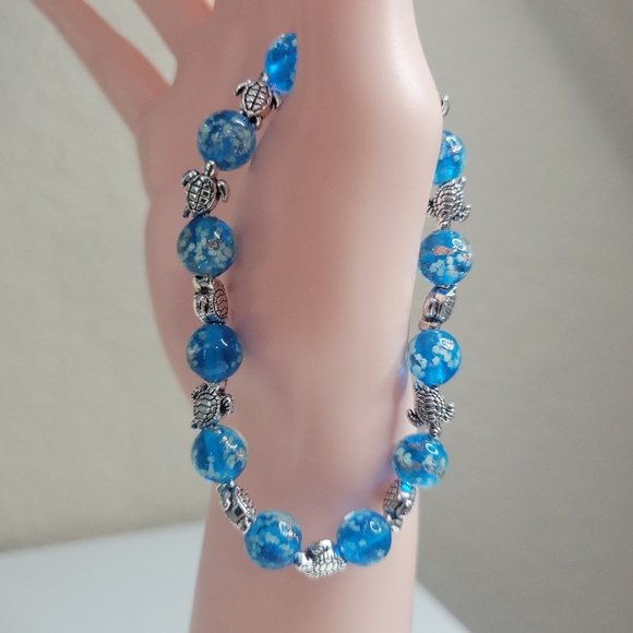 NWT Turtle Charms W Ocean Blue Glow In The Dark Firefly Glass Stretch Bracelet - Picture 5 of 14